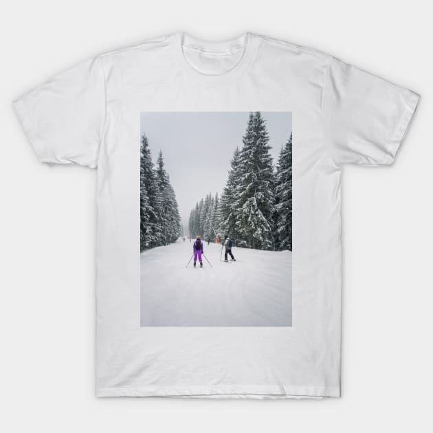 People skiing on the snowy slope T-Shirt by psychoshadow